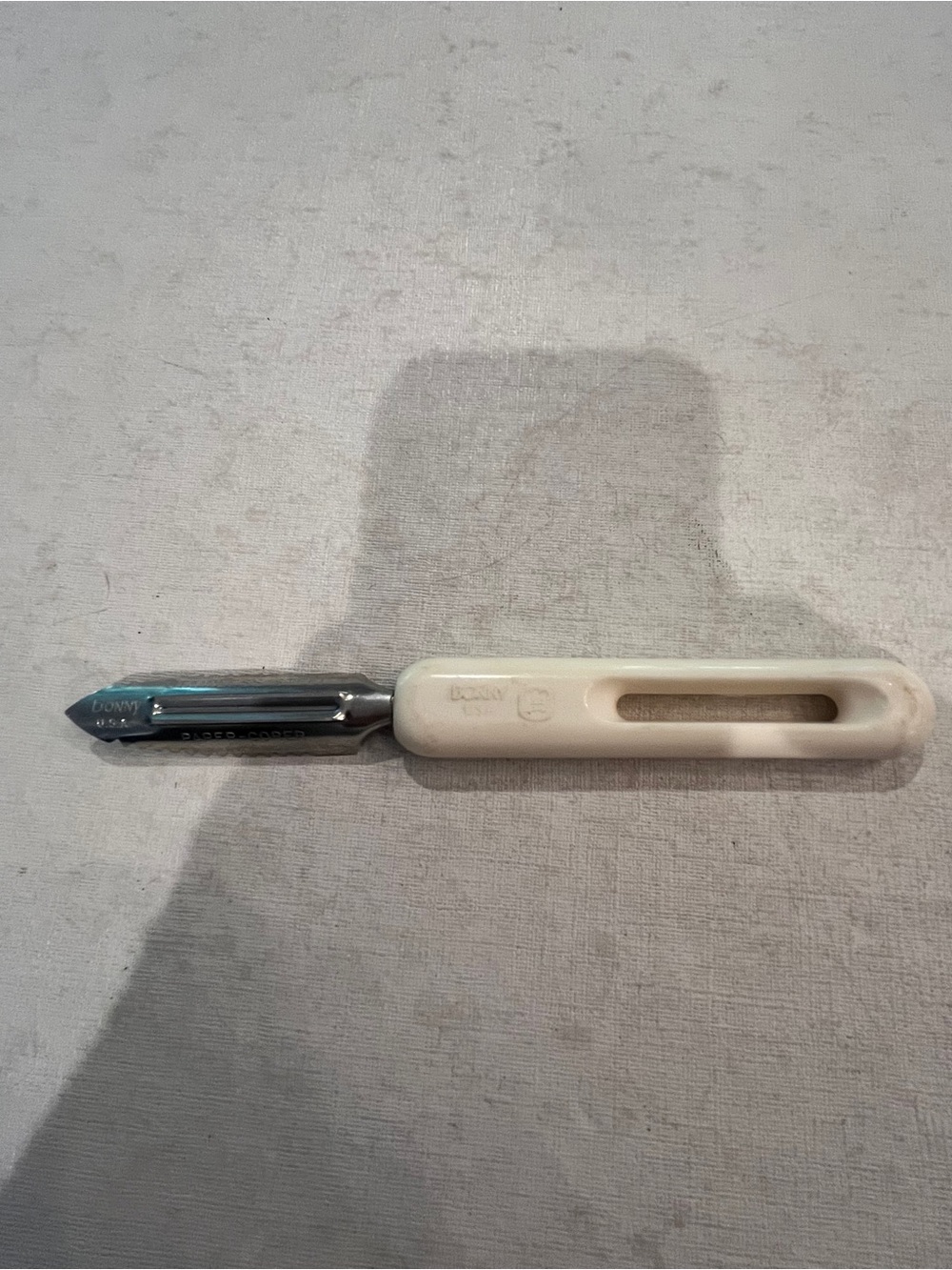 Vintage Bonny white plastic handled parer/ corer tool. GUC!